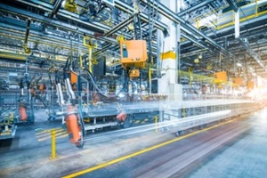 robots welding in a car factory