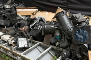 dump of vintage damaged stage lighting gear