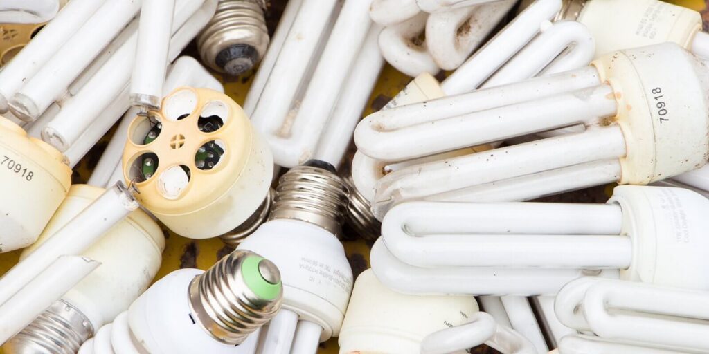 old burnt used fluorescent incandescent bulbs
